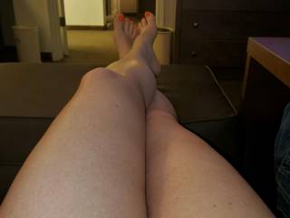 Wife\'s sexy legs and a peek of her beautiful hairy pussy.. would you like to get between those sexy legs ??