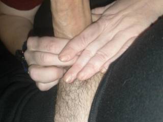I love it when she holds my cock with both hands and lets it gently slide all the way down her throat