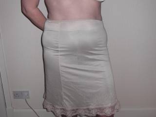 I'm with him but would his penis fit thru that little hole, love the idea though love your hips and slight rounded belly in your silky panties and slip!!