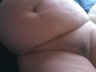 A big wobbly BBW belly and phat hairy pussy for cum splattering. Would you?