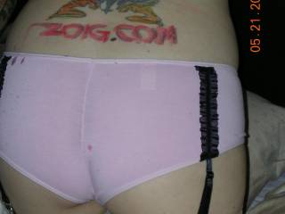 I love these cute pink cotton panties with garters and nylon hosiery.  It\'s easy to see when I get them all wet...