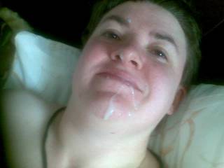 Facial shot with cum near corner of mouth