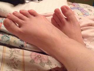 She had her creamy white feet crossed on the bed with those sexy toes driving me crazy and I had to preserve the moment in a close up photo.