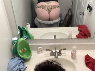 Her just showing off that amazing ass in the leopard print thong