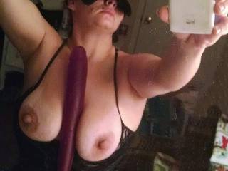 Fucking my big titties with my purple dildo wishing it was a real dick