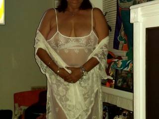 Hubby bought me lingerie. I put out on and he invited his friends over. My pussy wass so wet knowing they were coming over.