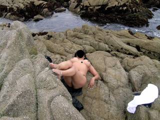 suntanning on a puplic beach(not a nude beach)
