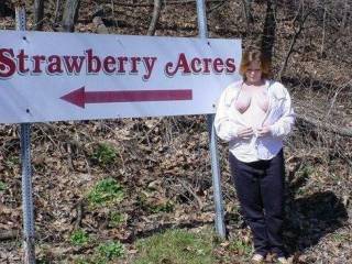 More of my wife flashing and posing with our local signage.  We love going out and getting pics of her flashing in public.