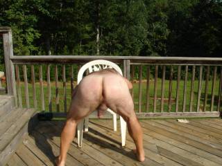 Here I am outside showing my ass, cock and balls. Any ladies like this view?  I would love to see ladies play with this pic with their strapon as if you are going to fuck my ass with a strapon.